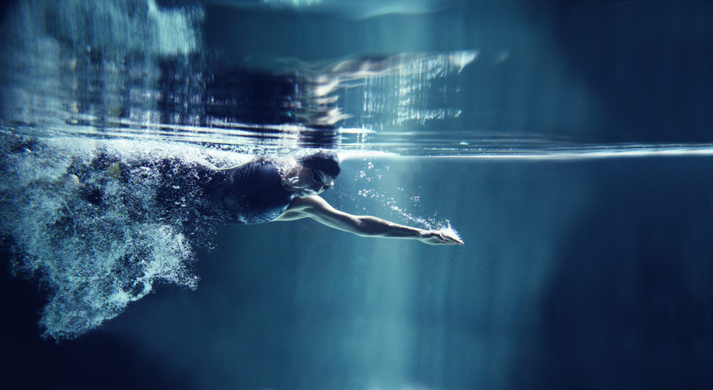 Athlete swimming freestyle